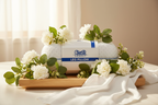 Contour Legacy Leg Pillow Gift Display with White Flowers and Green Leaves