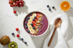Ivory organic latte stoneware bowl with acai smoothie bowl flat lay on marble