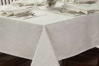 Close-up of white paisley jacquard damask tablecloth woven pattern