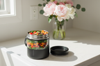 Pink vacuum insulated food jar open on kitchen counter