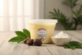 Refined Shea Butter with Shea Nuts and Green Leaves